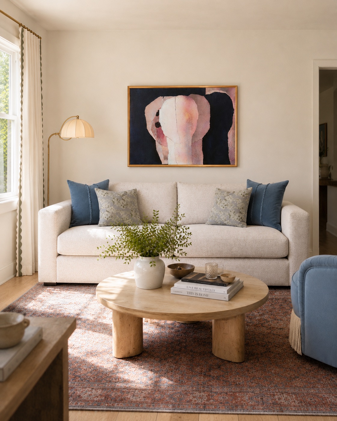 AI interior — beige sofa with blue pillows and abstract art
